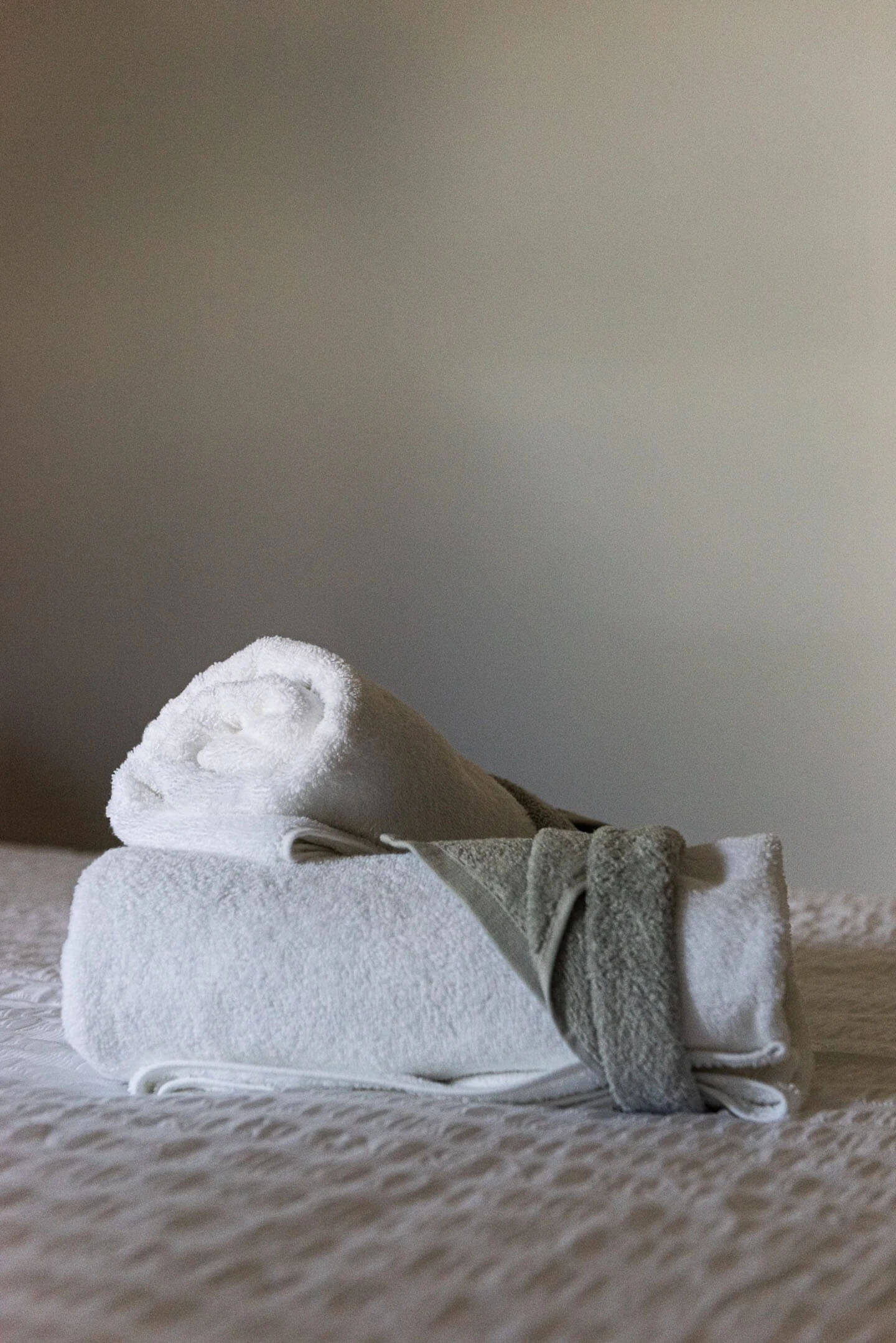 Towels Detail - Push white bath towels and face washers provided for every guest